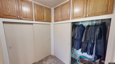 Welcome to this beautifully maintained Single-level home nestled on Paradise Valley Country Club in Wyoming - for sale on GolfHomes.com, golf home, golf lot