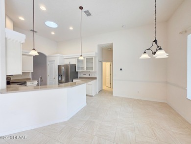 Beautiful 3-bedroom, 3-bath pool home, located in the exclusive on Halifax Plantation Golf Club in Florida - for sale on GolfHomes.com, golf home, golf lot