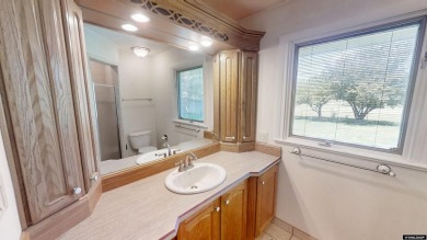 Welcome to this beautifully maintained Single-level home nestled on Paradise Valley Country Club in Wyoming - for sale on GolfHomes.com, golf home, golf lot