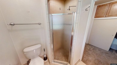 Welcome to this beautifully maintained Single-level home nestled on Paradise Valley Country Club in Wyoming - for sale on GolfHomes.com, golf home, golf lot