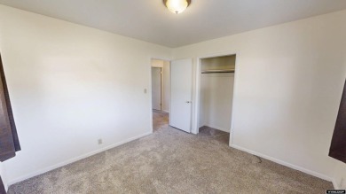 Welcome to this beautifully maintained Single-level home nestled on Paradise Valley Country Club in Wyoming - for sale on GolfHomes.com, golf home, golf lot