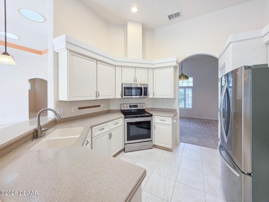 Beautiful 3-bedroom, 3-bath pool home, located in the exclusive on Halifax Plantation Golf Club in Florida - for sale on GolfHomes.com, golf home, golf lot