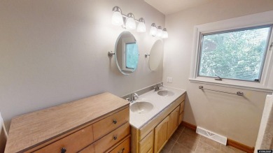 Welcome to this beautifully maintained Single-level home nestled on Paradise Valley Country Club in Wyoming - for sale on GolfHomes.com, golf home, golf lot