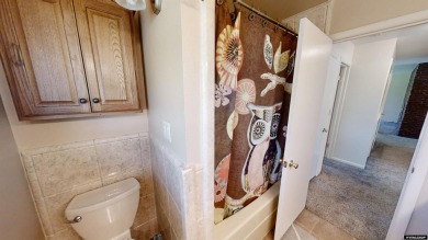 Welcome to this beautifully maintained Single-level home nestled on Paradise Valley Country Club in Wyoming - for sale on GolfHomes.com, golf home, golf lot