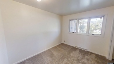 Welcome to this beautifully maintained Single-level home nestled on Paradise Valley Country Club in Wyoming - for sale on GolfHomes.com, golf home, golf lot