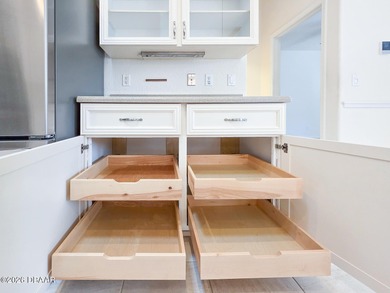 Beautiful 3-bedroom, 3-bath pool home, located in the exclusive on Halifax Plantation Golf Club in Florida - for sale on GolfHomes.com, golf home, golf lot