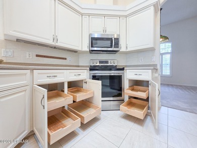 Beautiful 3-bedroom, 3-bath pool home, located in the exclusive on Halifax Plantation Golf Club in Florida - for sale on GolfHomes.com, golf home, golf lot