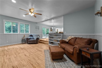 This fully updated home is nestled in a serene lake and golf on Seven Lakes Country Club in North Carolina - for sale on GolfHomes.com, golf home, golf lot