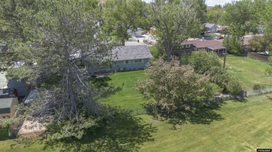 Welcome to this beautifully maintained Single-level home nestled on Paradise Valley Country Club in Wyoming - for sale on GolfHomes.com, golf home, golf lot