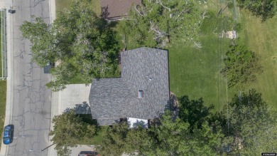 Welcome to this beautifully maintained Single-level home nestled on Paradise Valley Country Club in Wyoming - for sale on GolfHomes.com, golf home, golf lot