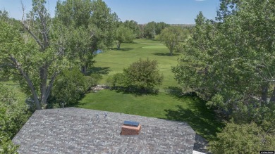 Welcome to this beautifully maintained Single-level home nestled on Paradise Valley Country Club in Wyoming - for sale on GolfHomes.com, golf home, golf lot