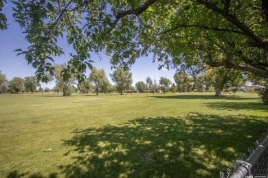 Welcome to this beautifully maintained Single-level home nestled on Paradise Valley Country Club in Wyoming - for sale on GolfHomes.com, golf home, golf lot