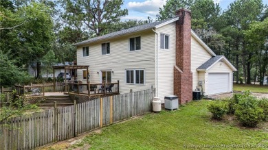 This fully updated home is nestled in a serene lake and golf on Seven Lakes Country Club in North Carolina - for sale on GolfHomes.com, golf home, golf lot