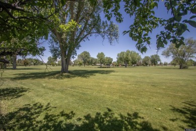 Welcome to this beautifully maintained Single-level home nestled on Paradise Valley Country Club in Wyoming - for sale on GolfHomes.com, golf home, golf lot