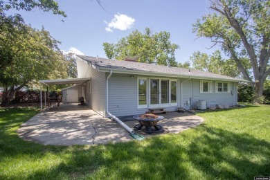 Welcome to this beautifully maintained Single-level home nestled on Paradise Valley Country Club in Wyoming - for sale on GolfHomes.com, golf home, golf lot