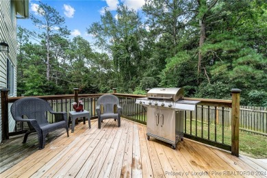 This fully updated home is nestled in a serene lake and golf on Seven Lakes Country Club in North Carolina - for sale on GolfHomes.com, golf home, golf lot