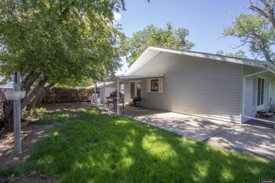 Welcome to this beautifully maintained Single-level home nestled on Paradise Valley Country Club in Wyoming - for sale on GolfHomes.com, golf home, golf lot