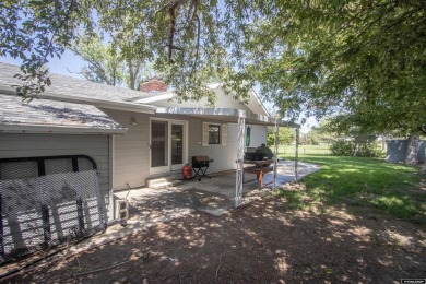Welcome to this beautifully maintained Single-level home nestled on Paradise Valley Country Club in Wyoming - for sale on GolfHomes.com, golf home, golf lot