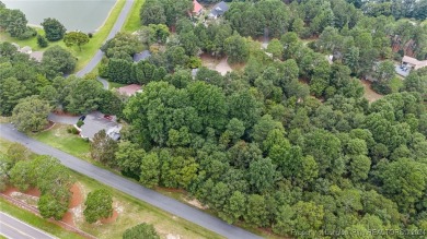 This fully updated home is nestled in a serene lake and golf on Seven Lakes Country Club in North Carolina - for sale on GolfHomes.com, golf home, golf lot