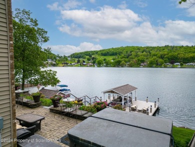 Indulge in the epitome of lakeside living with this exquisite on Scranton Canoe Club in Pennsylvania - for sale on GolfHomes.com, golf home, golf lot