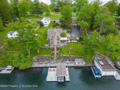 Indulge in the epitome of lakeside living with this exquisite on Scranton Canoe Club in Pennsylvania - for sale on GolfHomes.com, golf home, golf lot