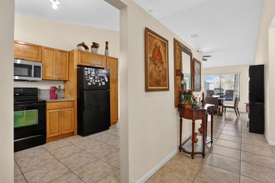 Stunning waterfront beauty on a quiet cul-de-sac street is on Colony West Country Club in Florida - for sale on GolfHomes.com, golf home, golf lot