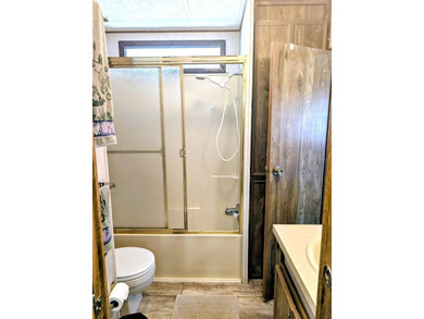 This adorable mobile home is ready for its next owner! The home on River Run Golf Links in Florida - for sale on GolfHomes.com, golf home, golf lot