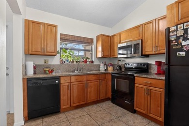 Stunning waterfront beauty on a quiet cul-de-sac street is on Colony West Country Club in Florida - for sale on GolfHomes.com, golf home, golf lot