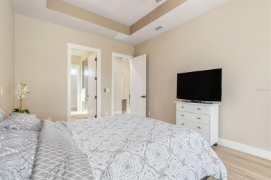 MODERN HOME Where Elegance Meets Florida Lifestyle in this on Pinemoor West Golf Club in Florida - for sale on GolfHomes.com, golf home, golf lot