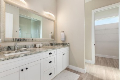 MODERN HOME Where Elegance Meets Florida Lifestyle in this on Pinemoor West Golf Club in Florida - for sale on GolfHomes.com, golf home, golf lot