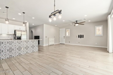 You'll love this ground level condominium that is ready to on Wigwam Golf  Resort Litchfield Park  in Arizona - for sale on GolfHomes.com, golf home, golf lot