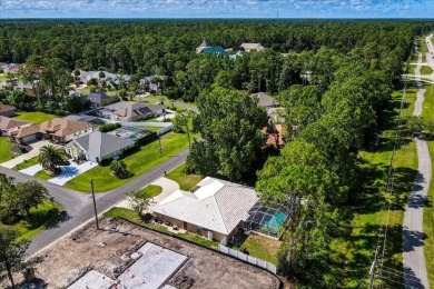 Discover the charm of 57 Woodhollow Dr, a stunning custom-built on The Grand Club - Pine Lakes Course in Florida - for sale on GolfHomes.com, golf home, golf lot