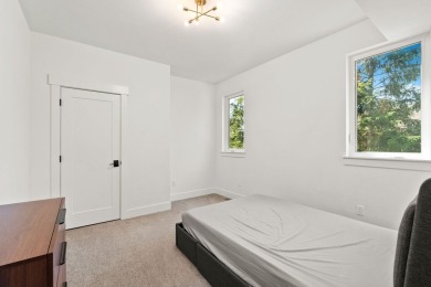 Modern design and Montana living come together in this 4-bedroom on Meadow Lake Golf Resort in Montana - for sale on GolfHomes.com, golf home, golf lot