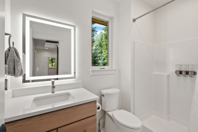 Modern design and Montana living come together in this 4-bedroom on Meadow Lake Golf Resort in Montana - for sale on GolfHomes.com, golf home, golf lot