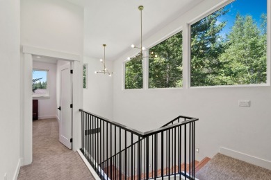 Modern design and Montana living come together in this 4-bedroom on Meadow Lake Golf Resort in Montana - for sale on GolfHomes.com, golf home, golf lot