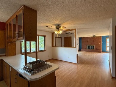 Close to the Country Club and golf course! This all-brick home on Holiday Island Golf Course in Arkansas - for sale on GolfHomes.com, golf home, golf lot