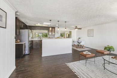 This charming home is located steps from the Hilo Municipal Golf on Hilo Municipal Golf Course in Hawaii - for sale on GolfHomes.com, golf home, golf lot