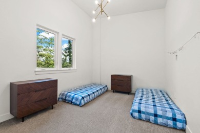 Modern design and Montana living come together in this 4-bedroom on Meadow Lake Golf Resort in Montana - for sale on GolfHomes.com, golf home, golf lot