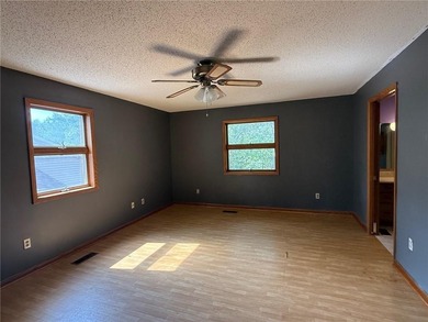 Close to the Country Club and golf course! This all-brick home on Holiday Island Golf Course in Arkansas - for sale on GolfHomes.com, golf home, golf lot