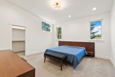Modern design and Montana living come together in this 4-bedroom on Meadow Lake Golf Resort in Montana - for sale on GolfHomes.com, golf home, golf lot