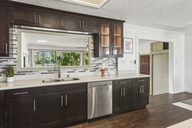 This charming home is located steps from the Hilo Municipal Golf on Hilo Municipal Golf Course in Hawaii - for sale on GolfHomes.com, golf home, golf lot