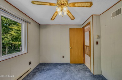 Won't you be my neighbor?  Come live on our circle in this happy on The Hideout Golf in Pennsylvania - for sale on GolfHomes.com, golf home, golf lot