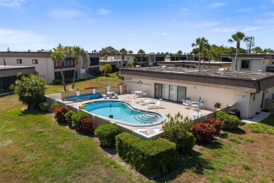 Welcome to this maintenance free, 55+, charming and serene 1st on Jacaranda West Country Club in Florida - for sale on GolfHomes.com, golf home, golf lot