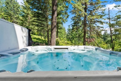 Modern design and Montana living come together in this 4-bedroom on Meadow Lake Golf Resort in Montana - for sale on GolfHomes.com, golf home, golf lot