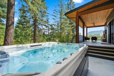 Modern design and Montana living come together in this 4-bedroom on Meadow Lake Golf Resort in Montana - for sale on GolfHomes.com, golf home, golf lot