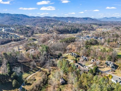 Welcome to this hidden gem in Fairway View Estates, a private on Reems Creek Golf Club in North Carolina - for sale on GolfHomes.com, golf home, golf lot