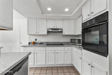 Step inside this 3-bedroom patio home in the sought-after on Leisure World Country Club in Arizona - for sale on GolfHomes.com, golf home, golf lot