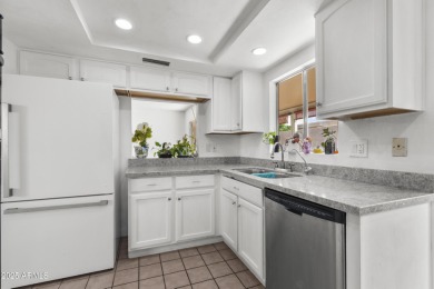 Step inside this 3-bedroom patio home in the sought-after on Leisure World Country Club in Arizona - for sale on GolfHomes.com, golf home, golf lot