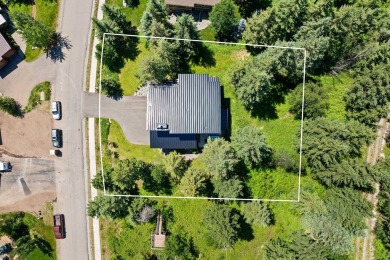 This striking 4-bedroom, 3-bathroom tri-level home combines on Meadow Lake Golf Resort in Montana - for sale on GolfHomes.com, golf home, golf lot