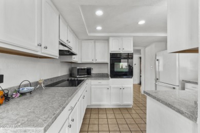 Step inside this 3-bedroom patio home in the sought-after on Leisure World Country Club in Arizona - for sale on GolfHomes.com, golf home, golf lot